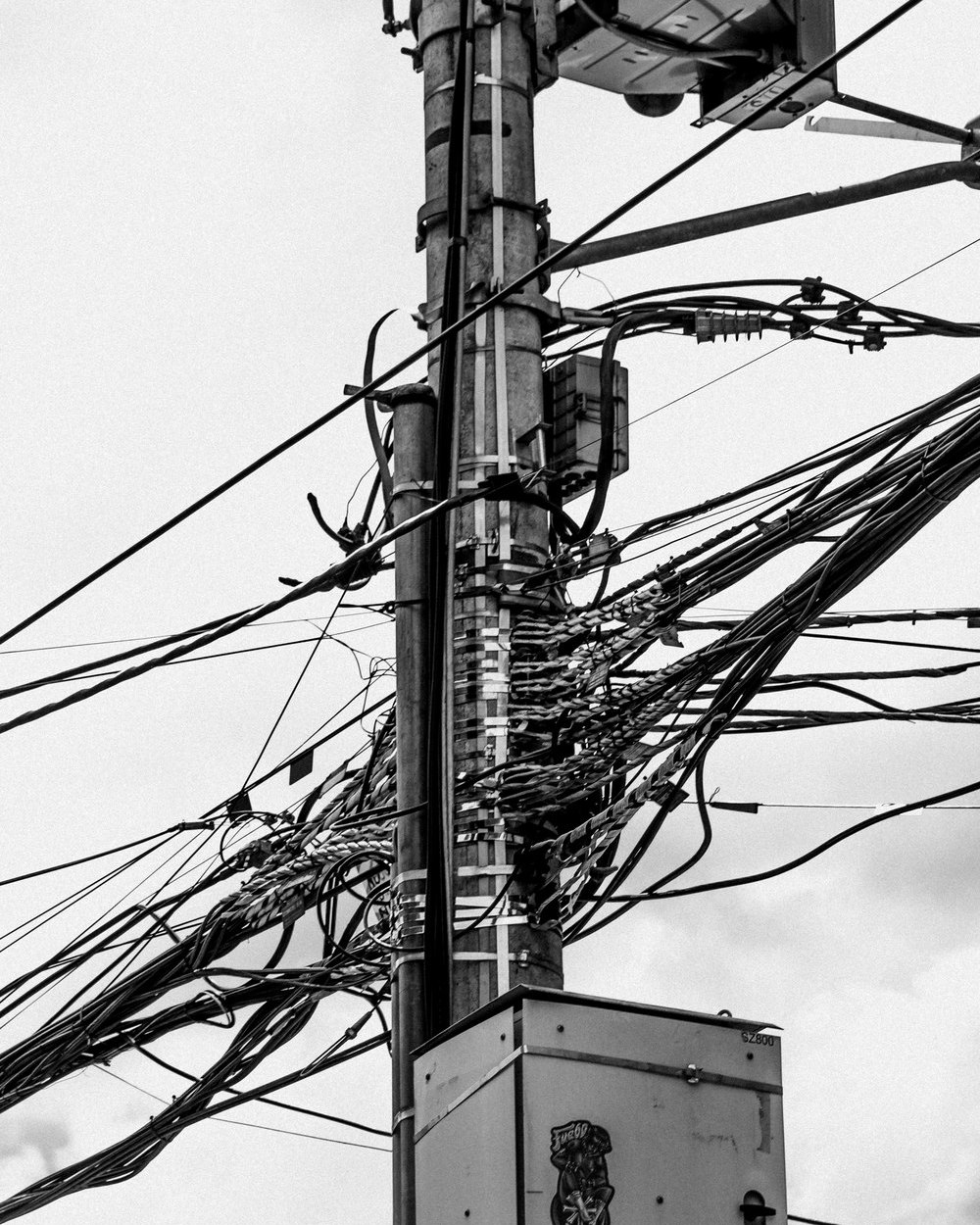 Tangled network cables in a server rack, like a disconnected set of marketing vendors.